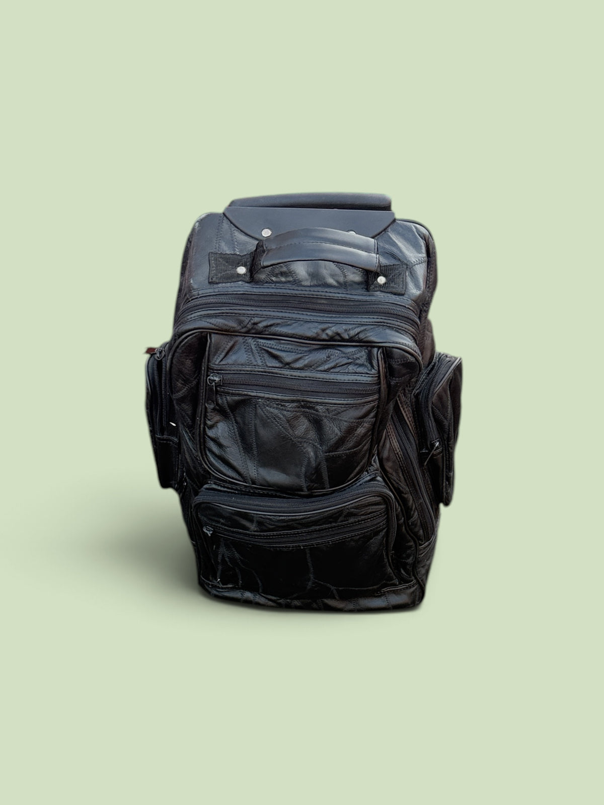 Great black colored backpack with handling wheels for easy travel through the airport